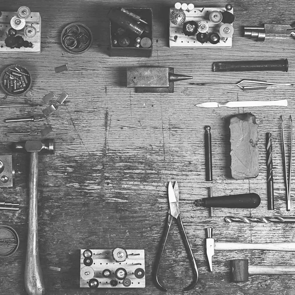 Jewellery-making tools on a workbench